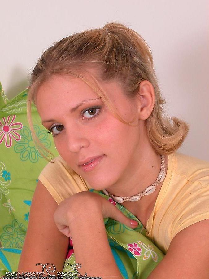 20P Pictures of Karen Dreams stripping in bed