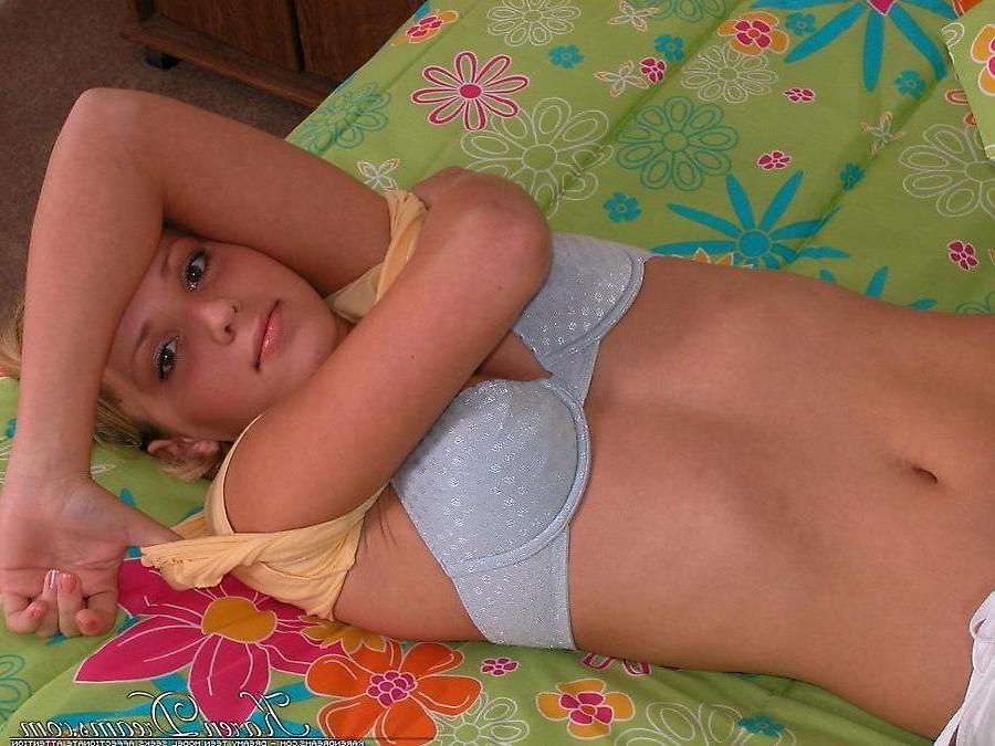 20P Pictures of Karen Dreams stripping in bed