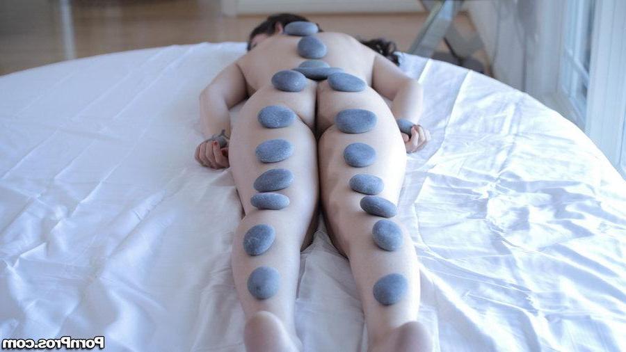 16P Busty beauty Karina White gets an erotic stone massage