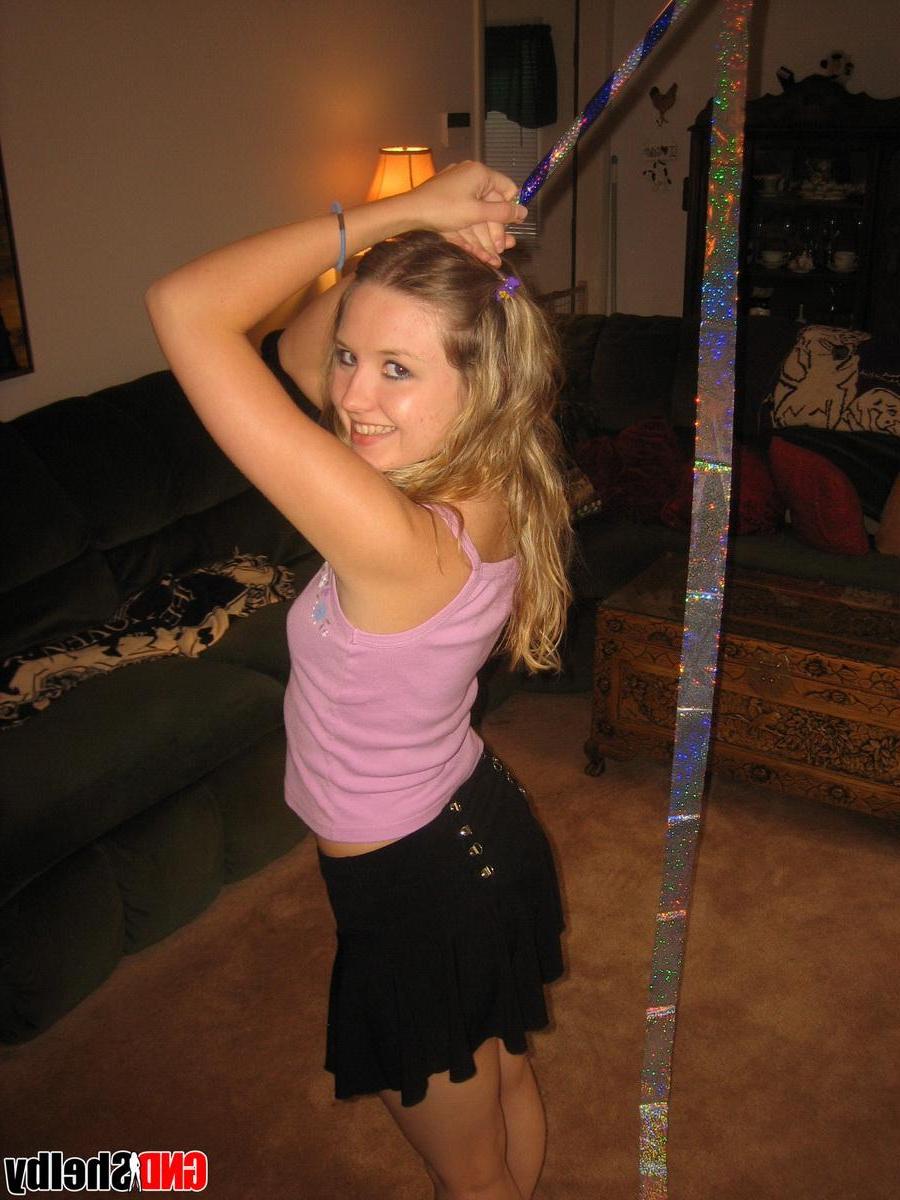 12P Playful Shelby has some fun with her streamer before stripping naked and teasing herself