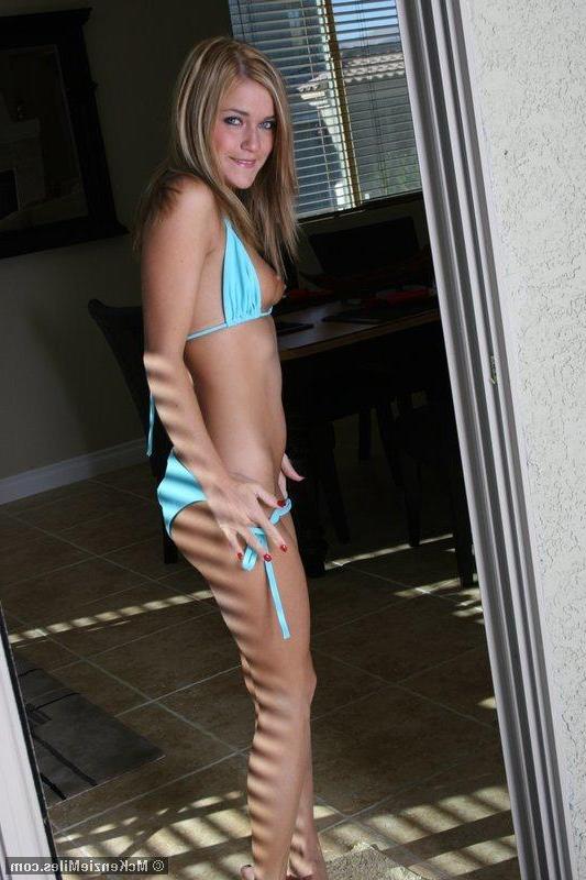 20P Pictures of teen star McKenzie Miles stripping out of her bikini