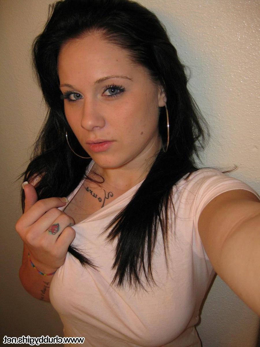 15P Busty girl Mia shows off her big natural boobs in the mirror