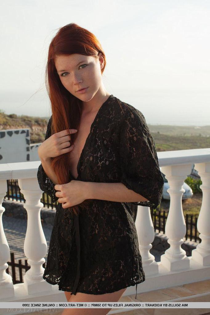 18P Redhead teen Mia Sollis displays her hot nude body on the balcony