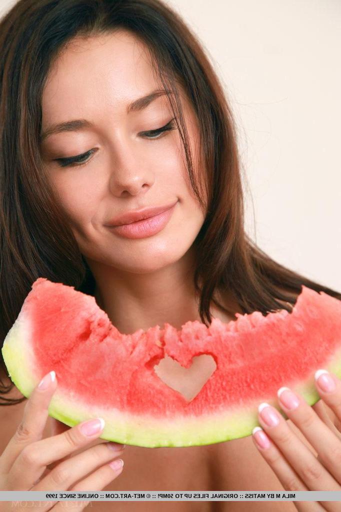 18P Mila M gets naughty and naked while eating a watermelon