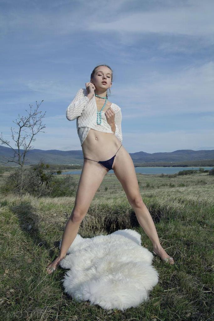 12P Milena D spreads her pink pussy for you on the beautiful landscape