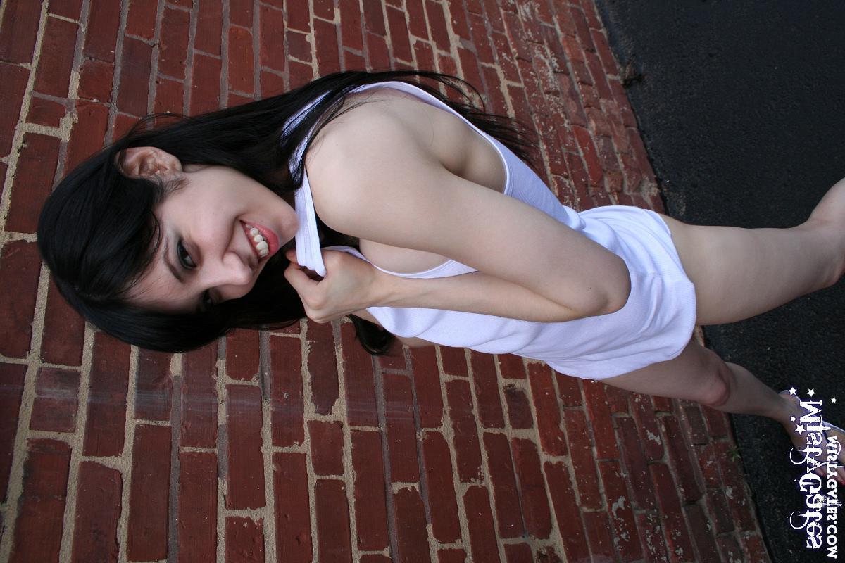 20P Pictures of Misty Gates stripping for you outside