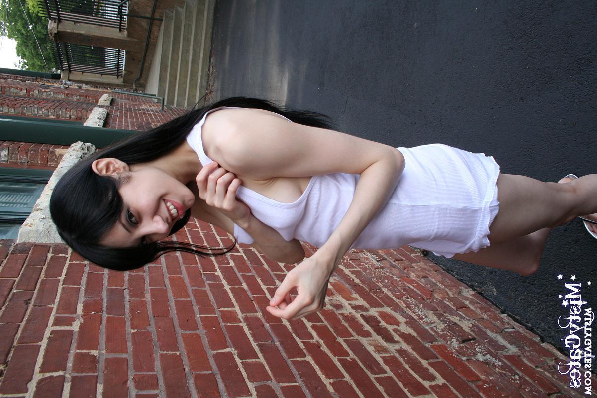 20P Pictures of Misty Gates stripping for you outside