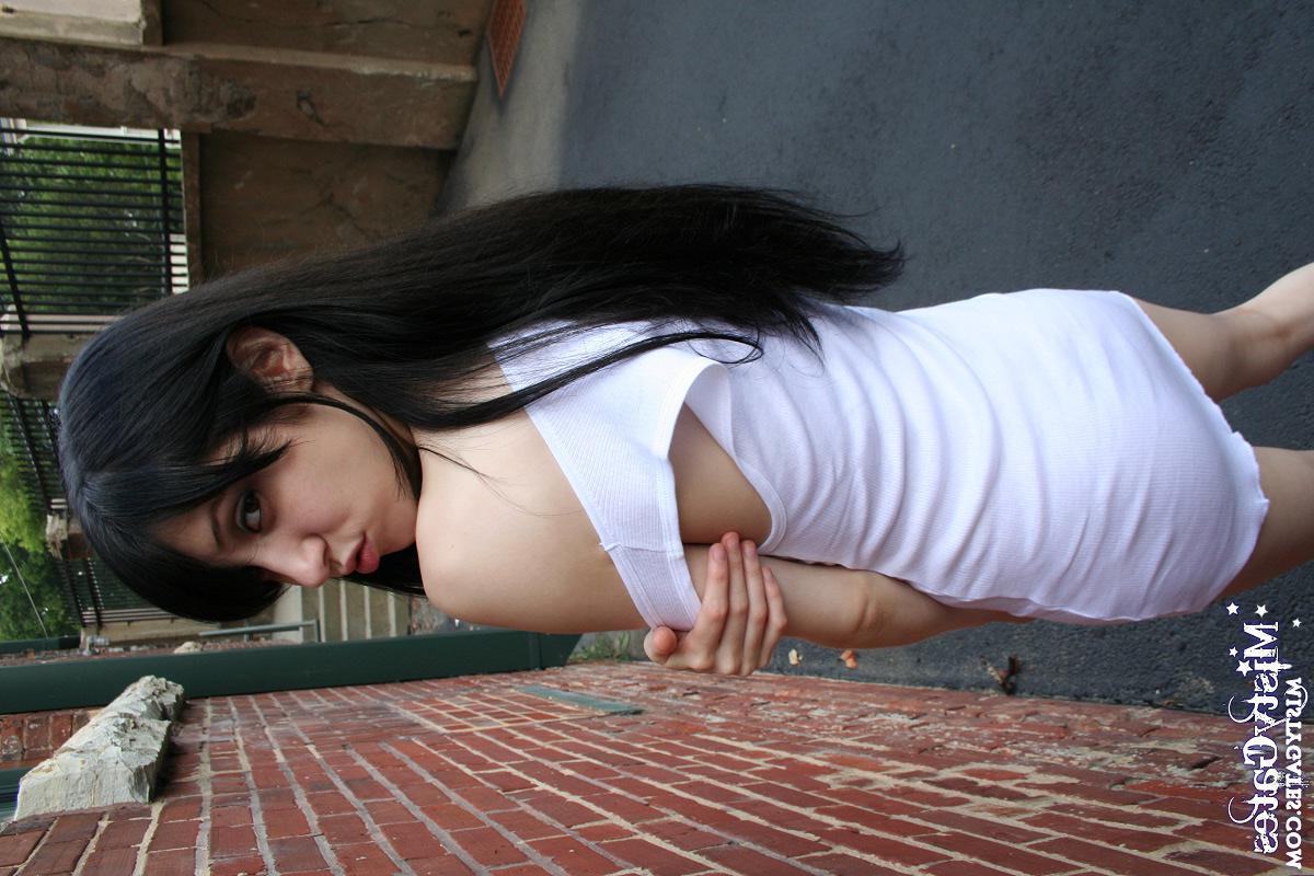 20P Pictures of Misty Gates stripping for you outside