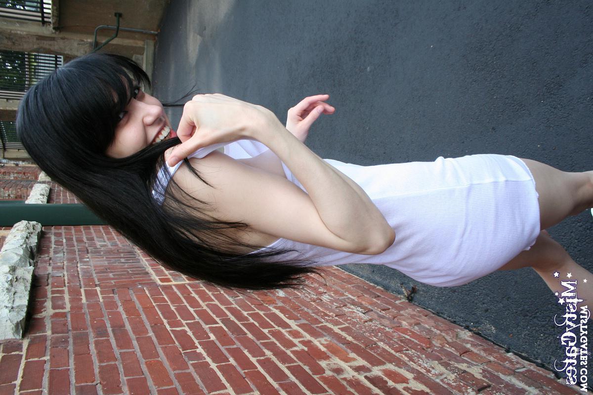 20P Pictures of Misty Gates stripping for you outside