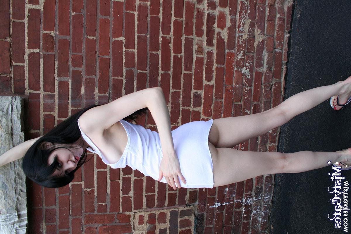 20P Pictures of Misty Gates stripping for you outside