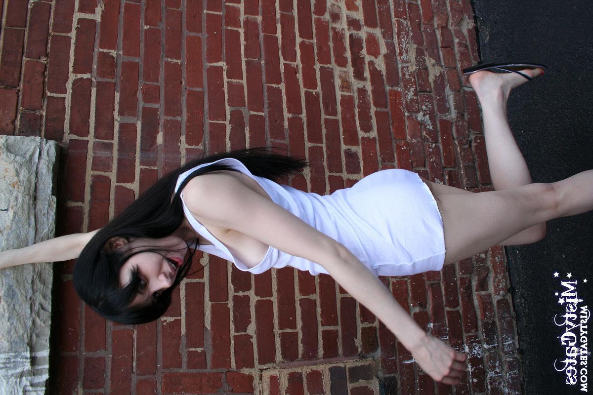 20P Pictures of Misty Gates stripping for you outside