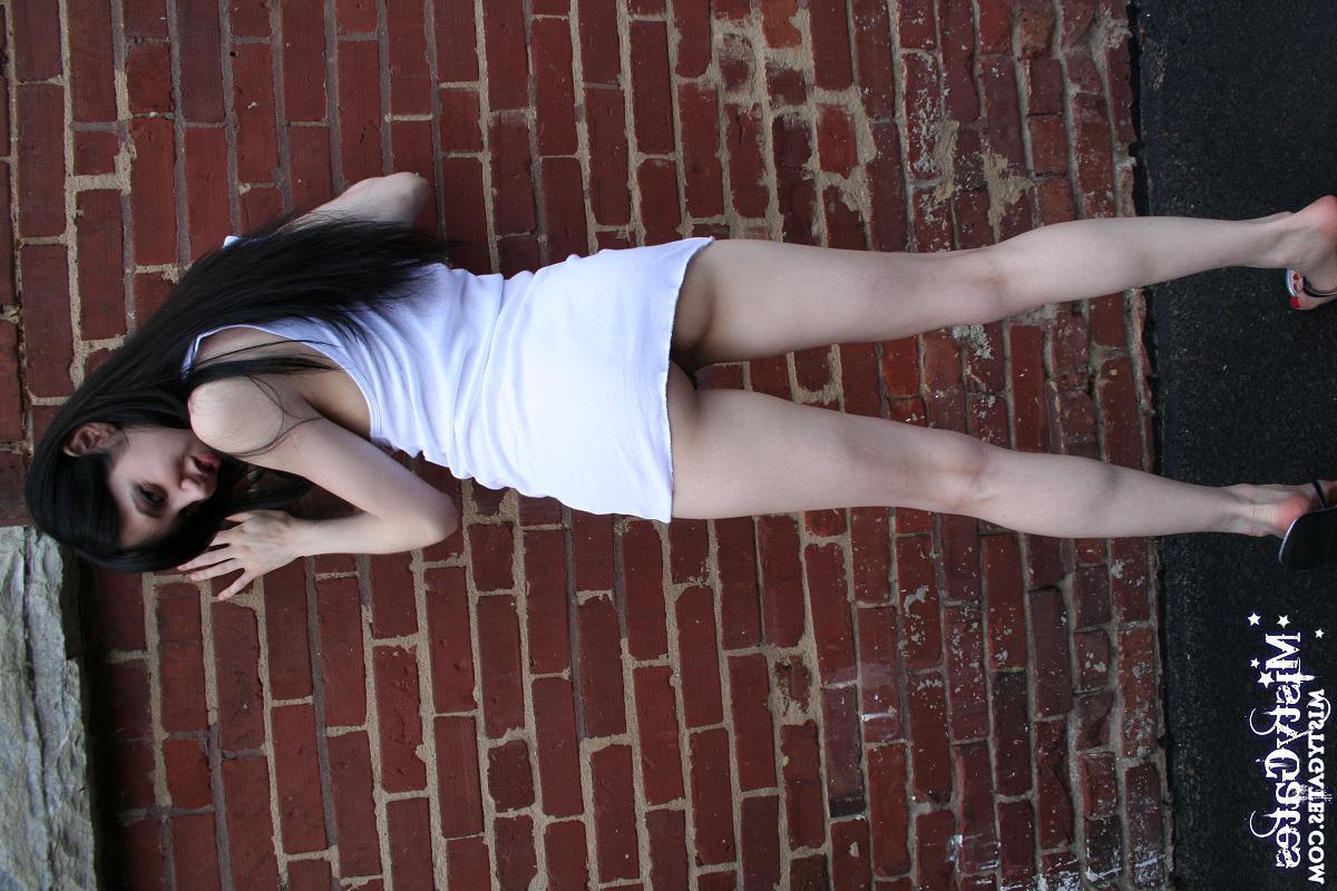 20P Pictures of Misty Gates stripping for you outside