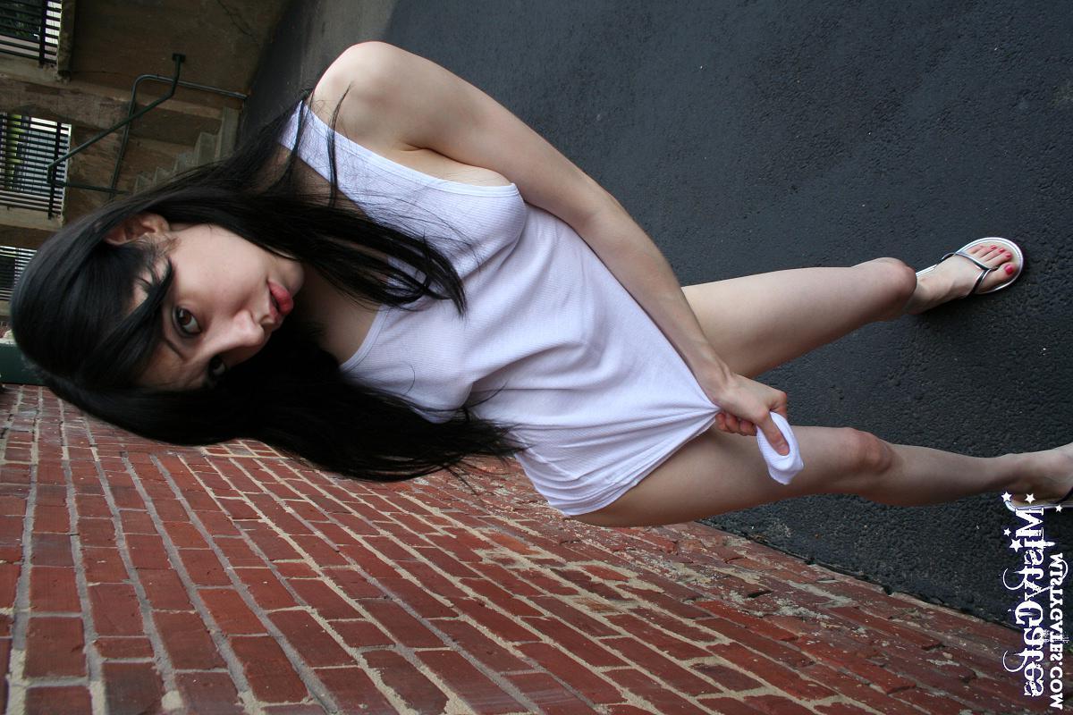 20P Pictures of Misty Gates stripping for you outside