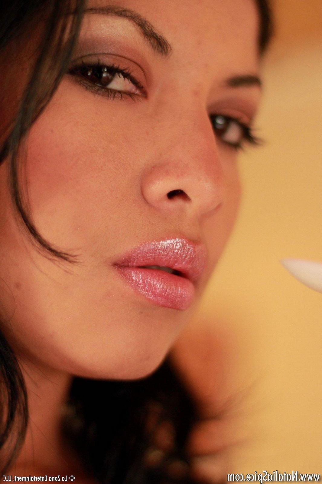 15P Natalia Spice enjoys the sweet taste of a treat as she dances on a pole