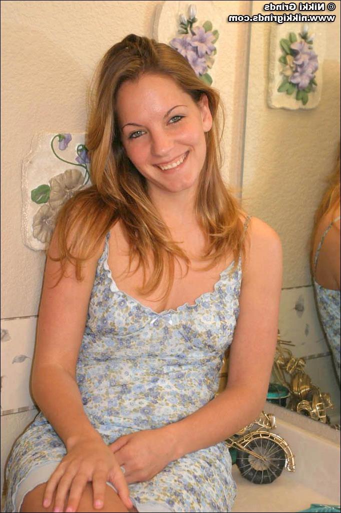 20P Pictures of teen amateur Nikki Grinds stripping down to her panties