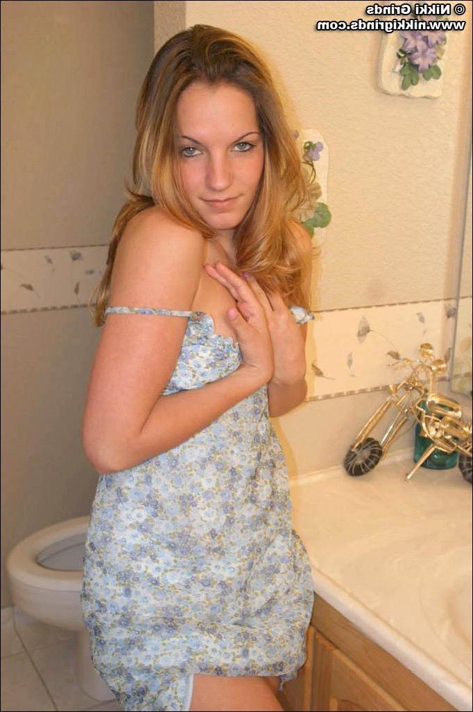 20P Pictures of teen amateur Nikki Grinds stripping down to her panties