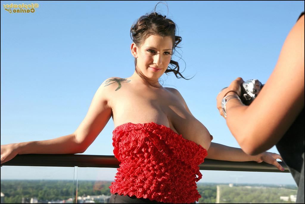 12P Candids of September Carrino showing off her big boobs on a balcony