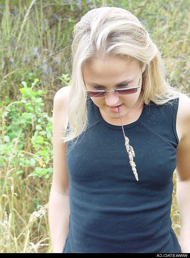 20P Pictures of Staci.ca stripping to her thong outside