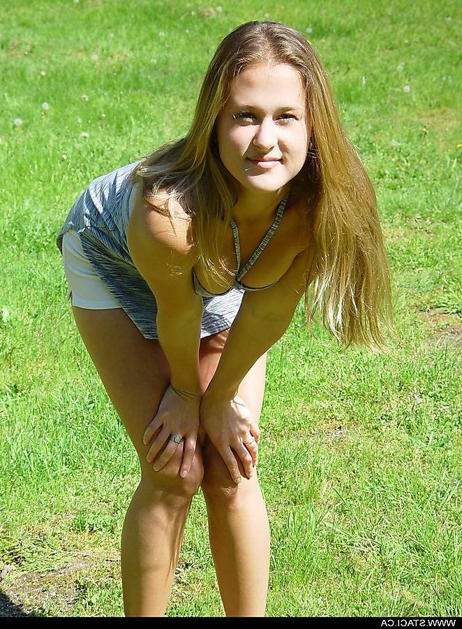 20P Pictures of teen babe Staci.ca stripping in the back yard