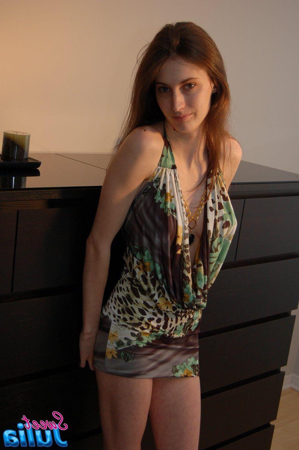 12P Pictures of Sweet Julia exposing her big boobs