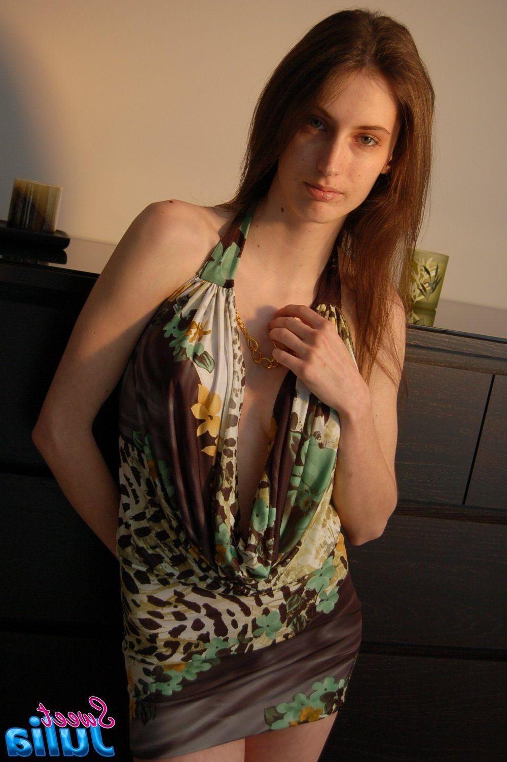 12P Pictures of Sweet Julia exposing her big boobs