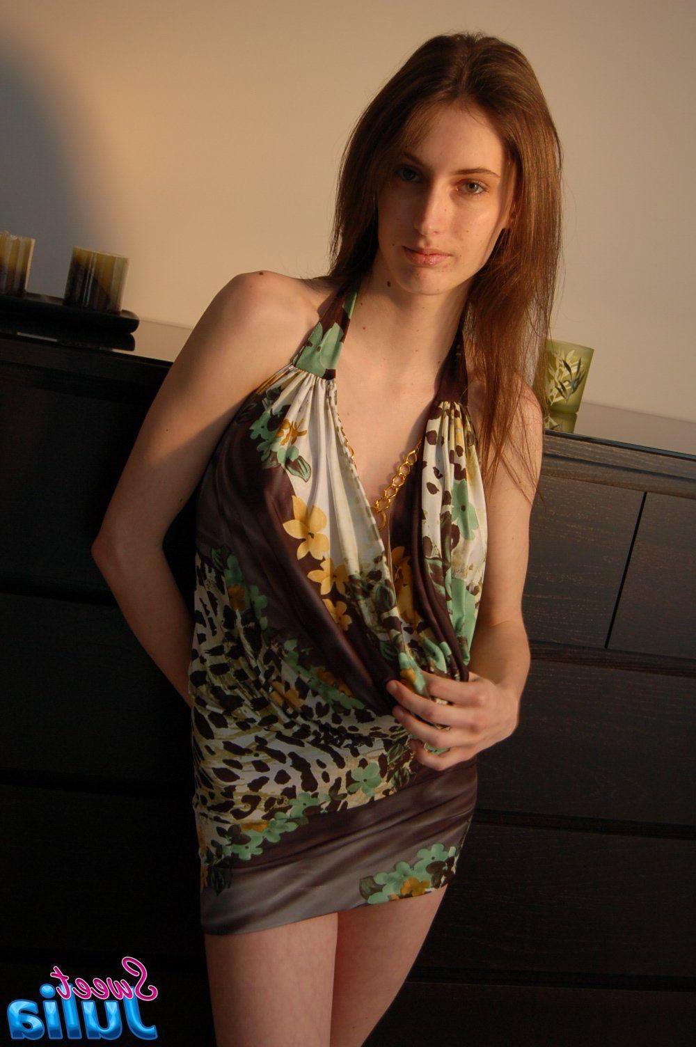 12P Pictures of Sweet Julia exposing her big boobs