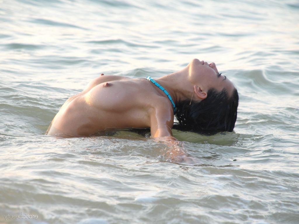 16P Brunette teen Margo A strips naked and goes for a swim