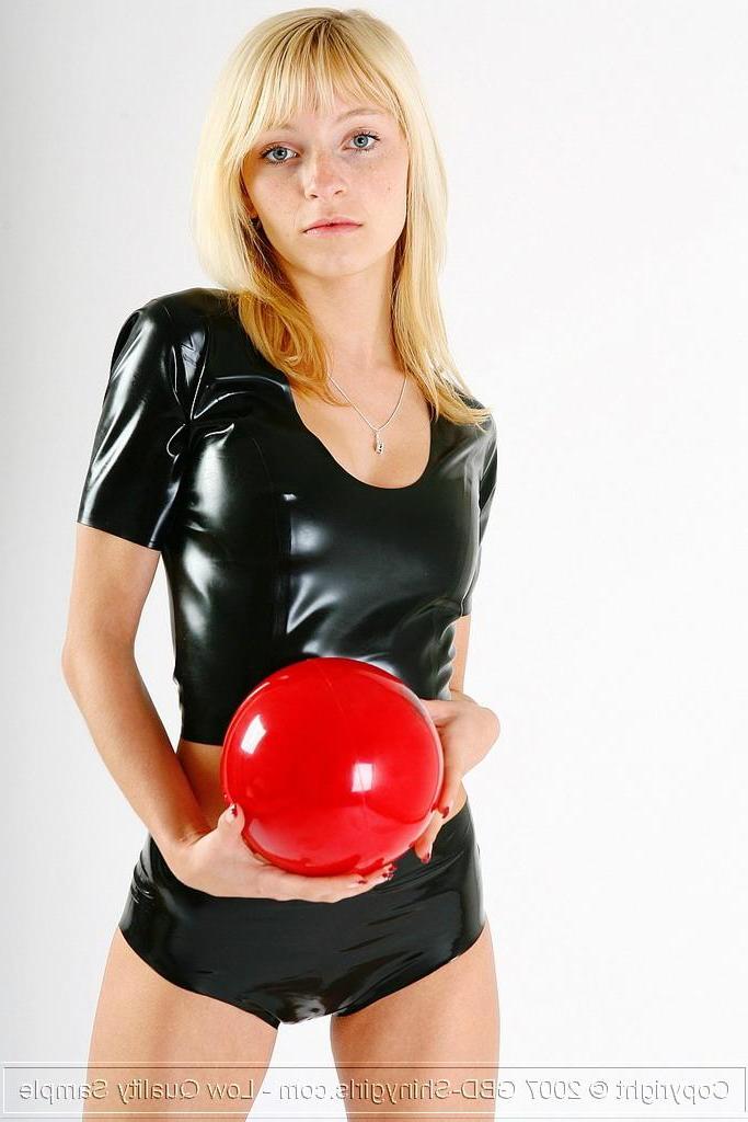 16P Pictures of a hot blonde shinygirl playing with a red ball