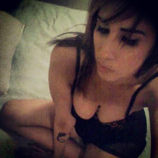 10P Pierced and tattooed chick strips naked while camwhoring