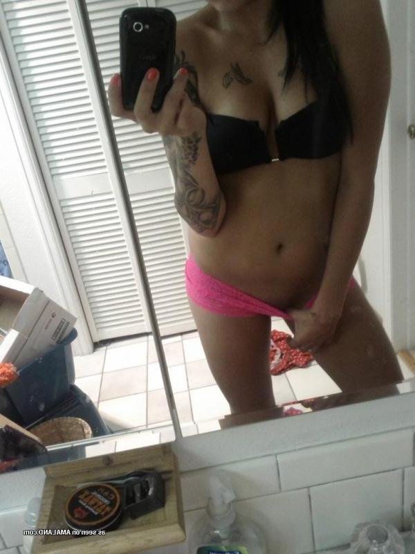 14P Gorgeous inked chick flashing her fine tits and sexy ass