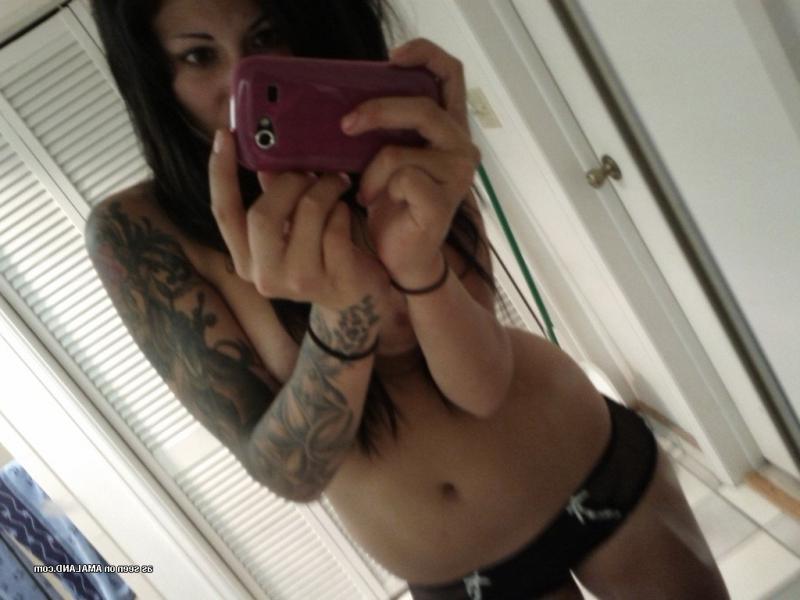 14P Gorgeous inked chick flashing her fine tits and sexy ass