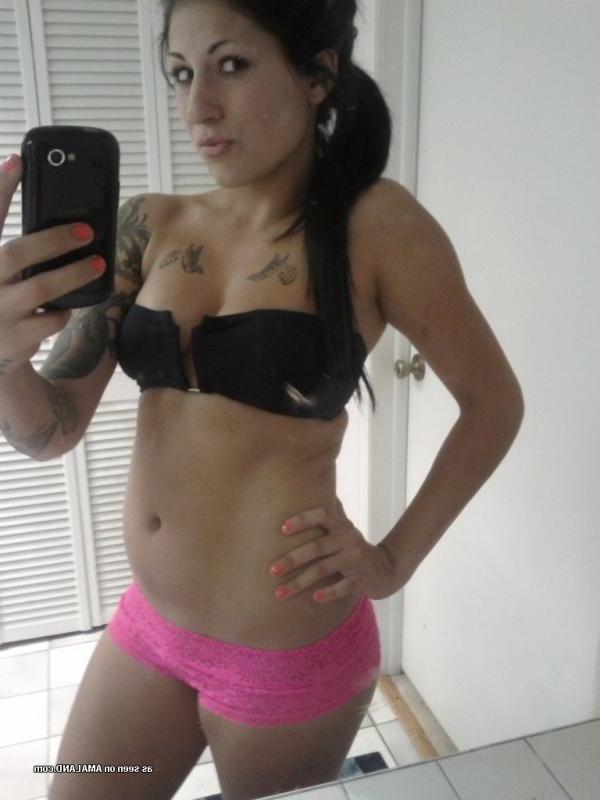 14P Gorgeous inked chick flashing her fine tits and sexy ass