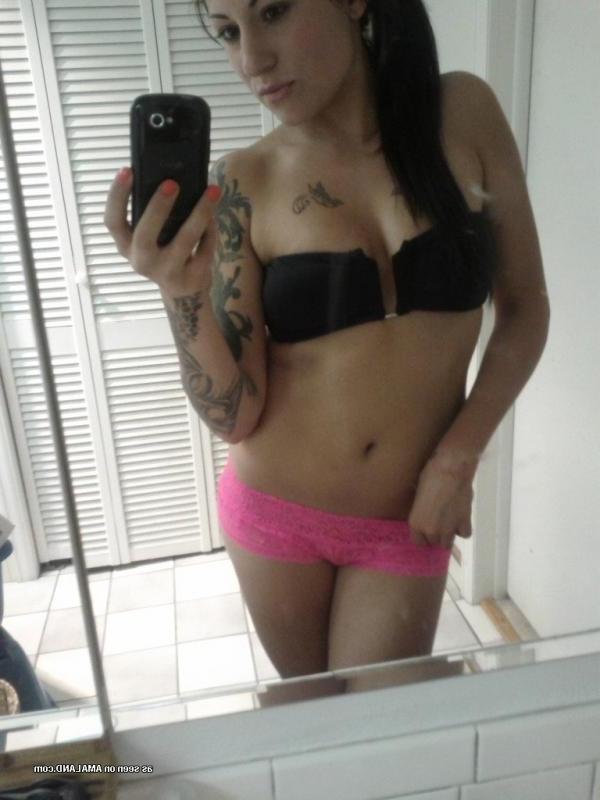 14P Gorgeous inked chick flashing her fine tits and sexy ass