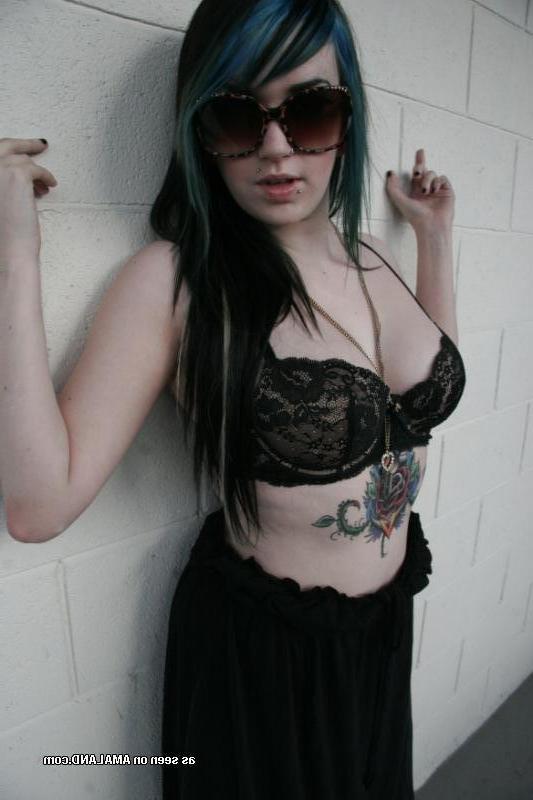 14P Collection of a kinky punk chick flashing her tits and ass