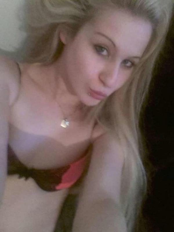 14P Hot blonde teen shows her tight figure in lingerie while posing