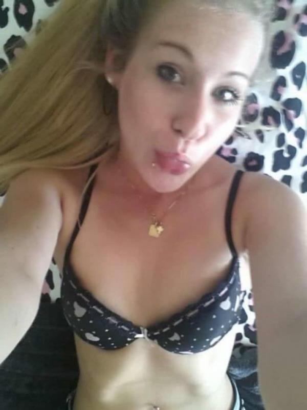14P Hot blonde teen shows her tight figure in lingerie while posing