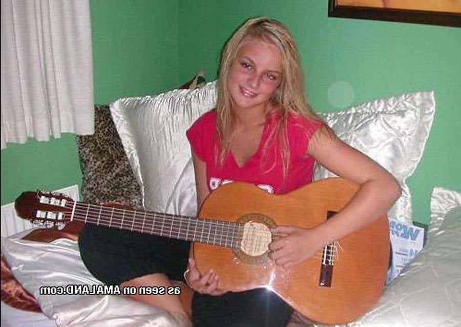 15P Blonde rockstar cutie posing with her guitar