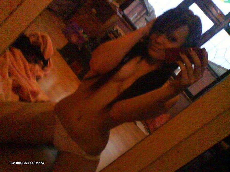 16P Gorgeous brunette girlfriend shows off her ass in lingerie