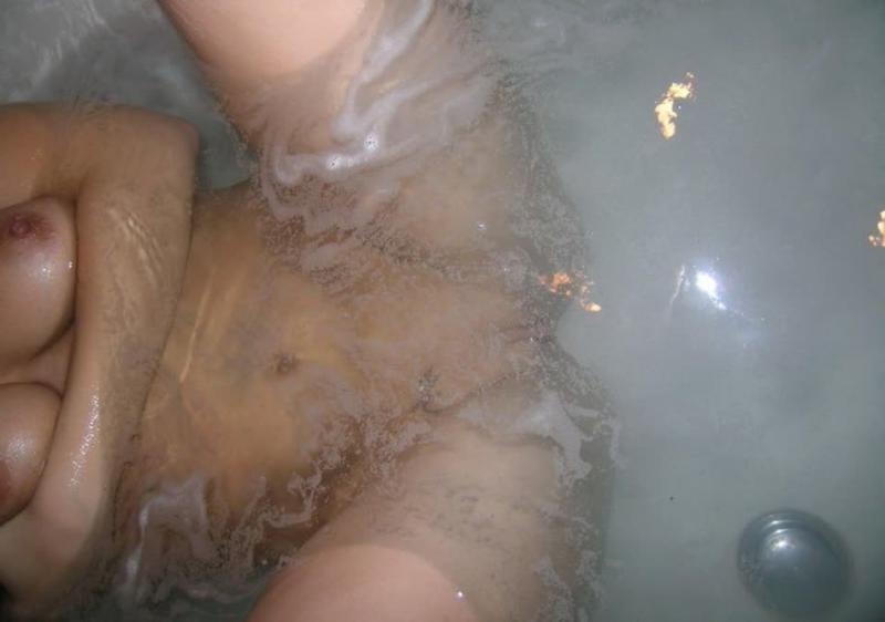 10P Blonde college hottie teases on cam in the hot tub