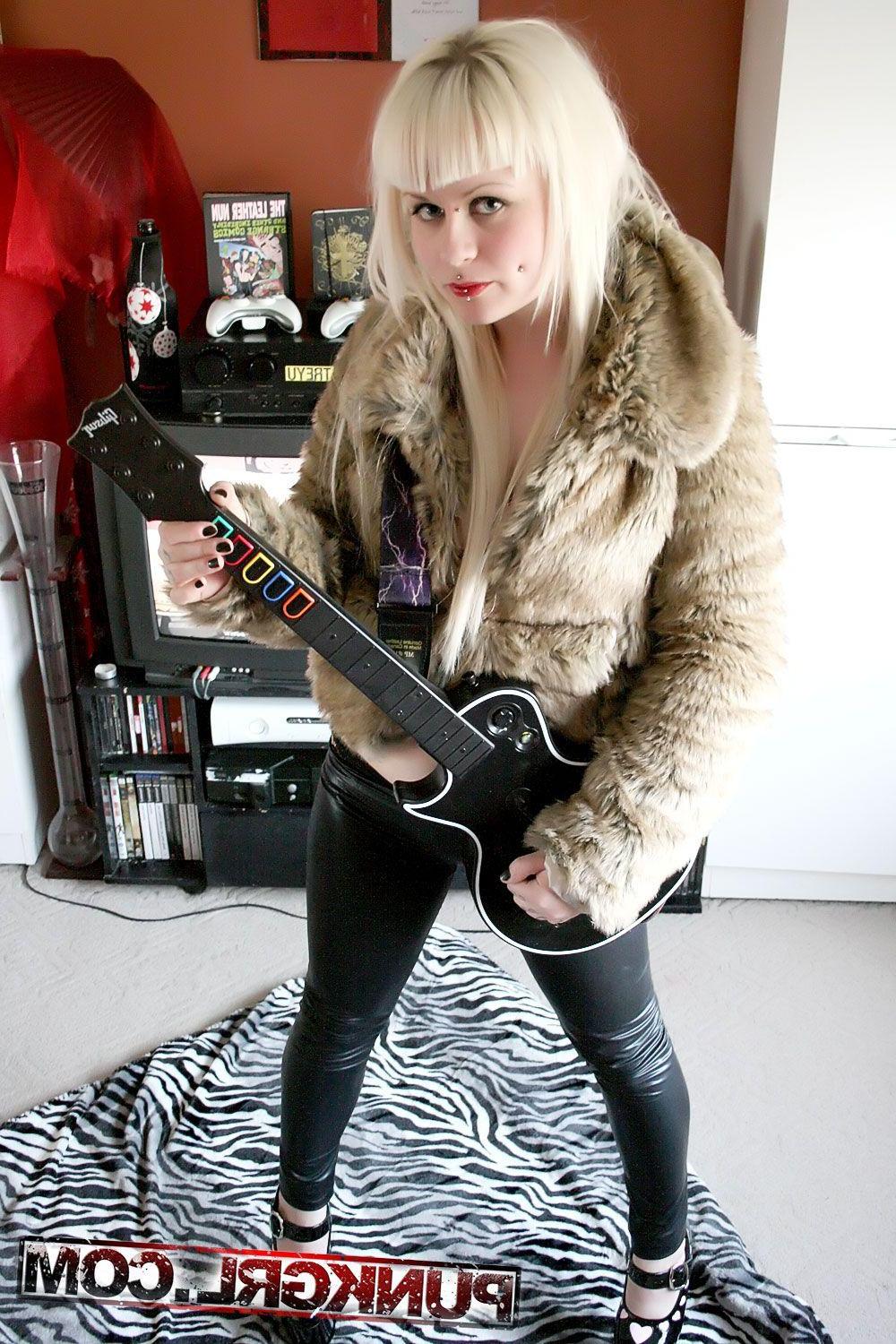 15P Pictures of punk girl Angel showing her big boobs