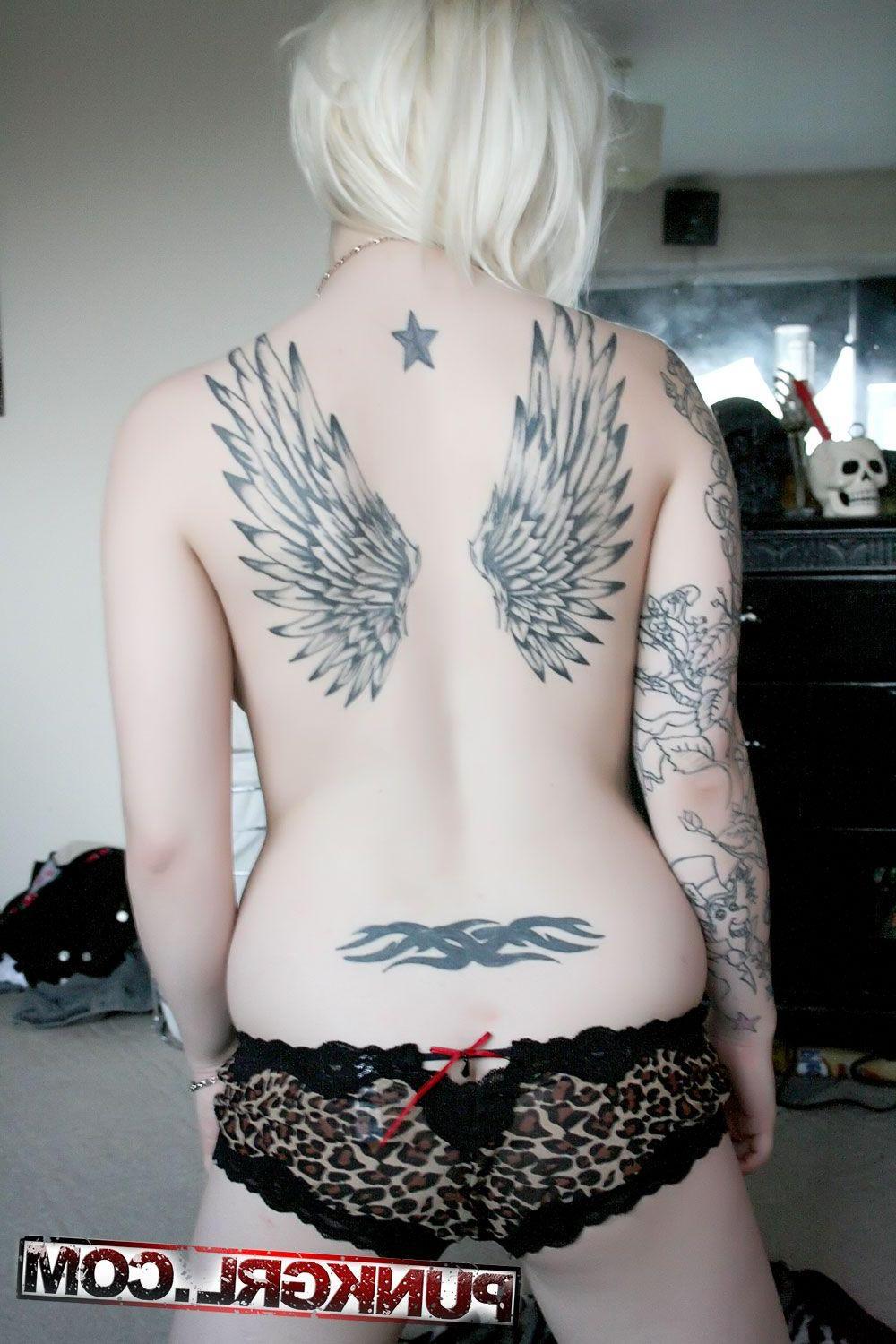 15P Pictures of punk girl Angel showing her big boobs