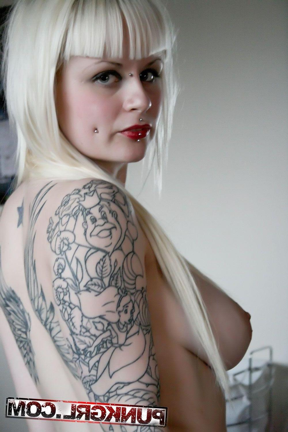 15P Pictures of punk girl Angel showing her big boobs