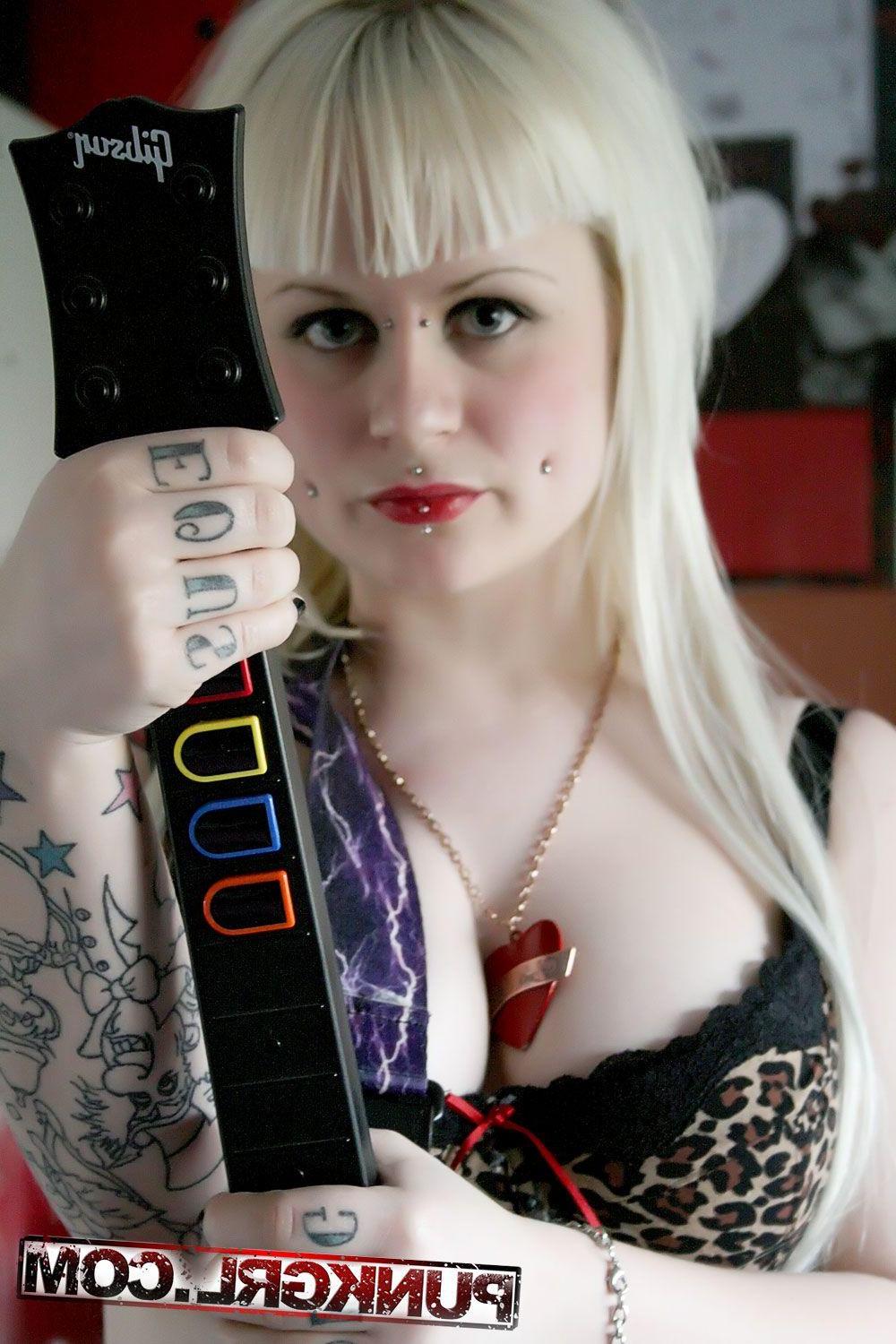 15P Pictures of punk girl Angel showing her big boobs