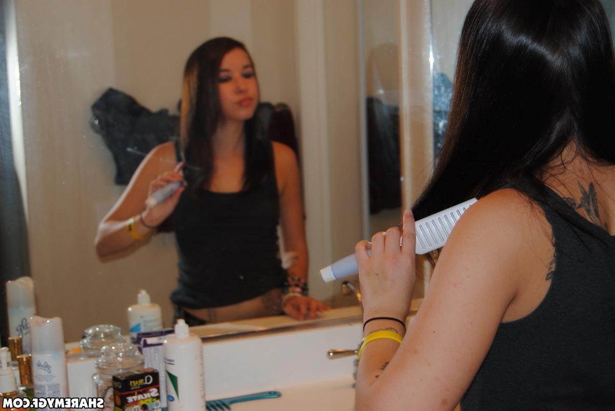 12P Perky girlfriend gets ready for school in a slutty little skirt