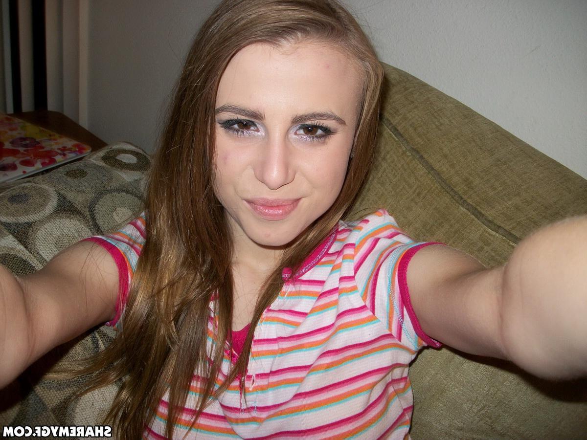 12P Naughty GF takes selfshot pictures of her perfect round ass in a pink thong