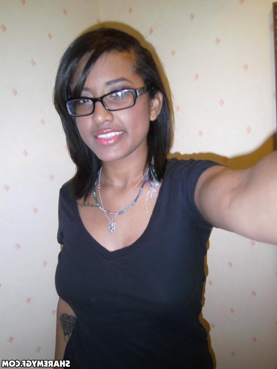 12P Cute black girlfriend teases with her perky tits while taking selfshot pictures