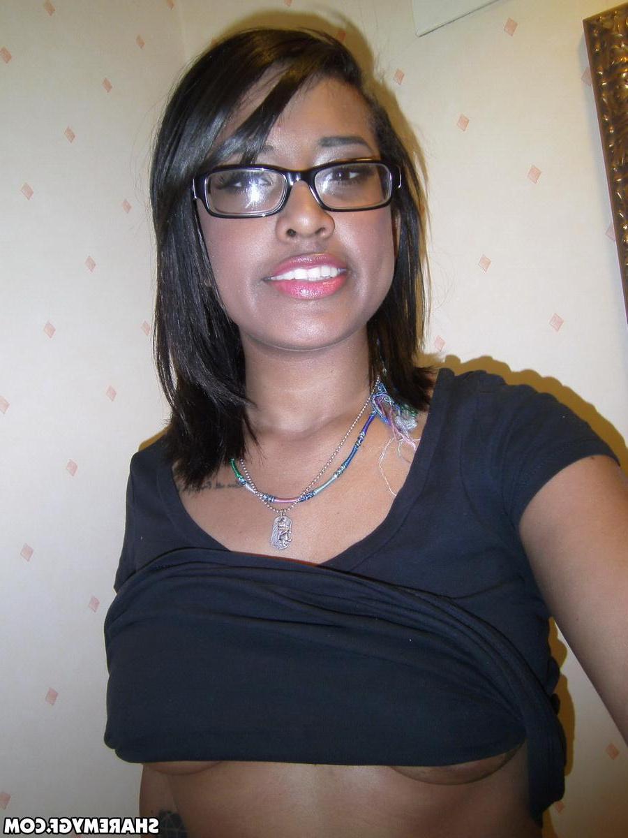 12P Cute black girlfriend teases with her perky tits while taking selfshot pictures