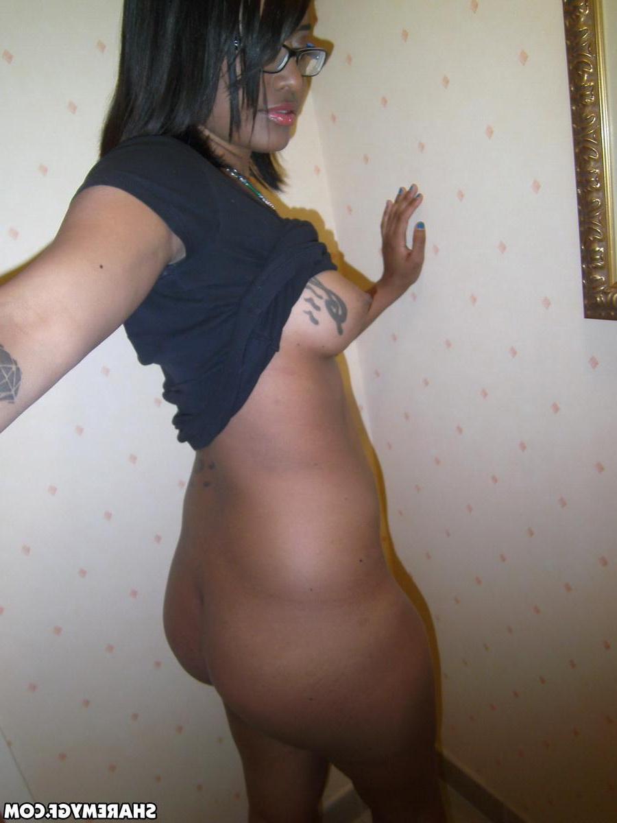 12P Cute black girlfriend teases with her perky tits while taking selfshot pictures