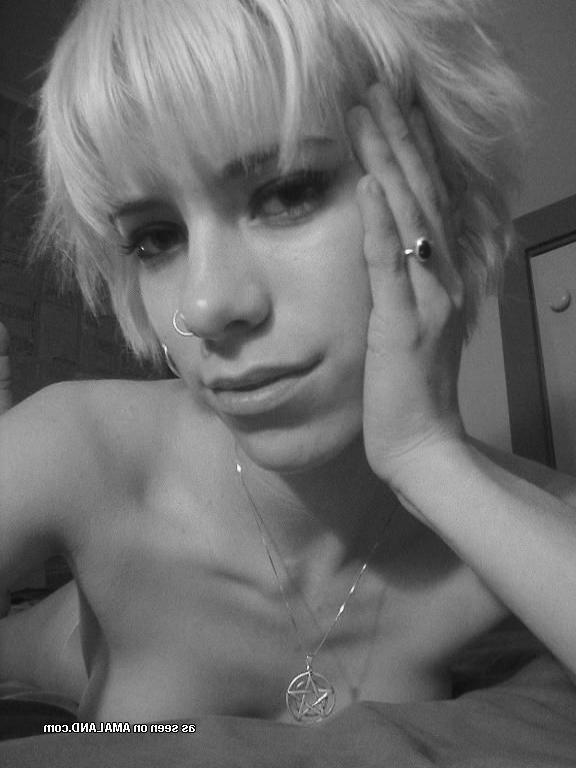 18P Photos of a horny pierced babe displaying her naked body