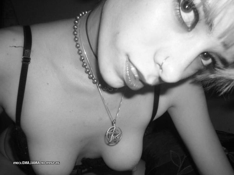 18P Photos of a horny pierced babe displaying her naked body